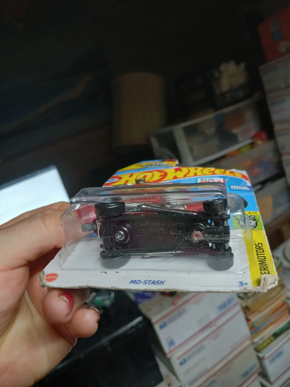 Mo-Stash die-cast toy car from the 2024 Hot Wheels Experimotors series (4/5, mai